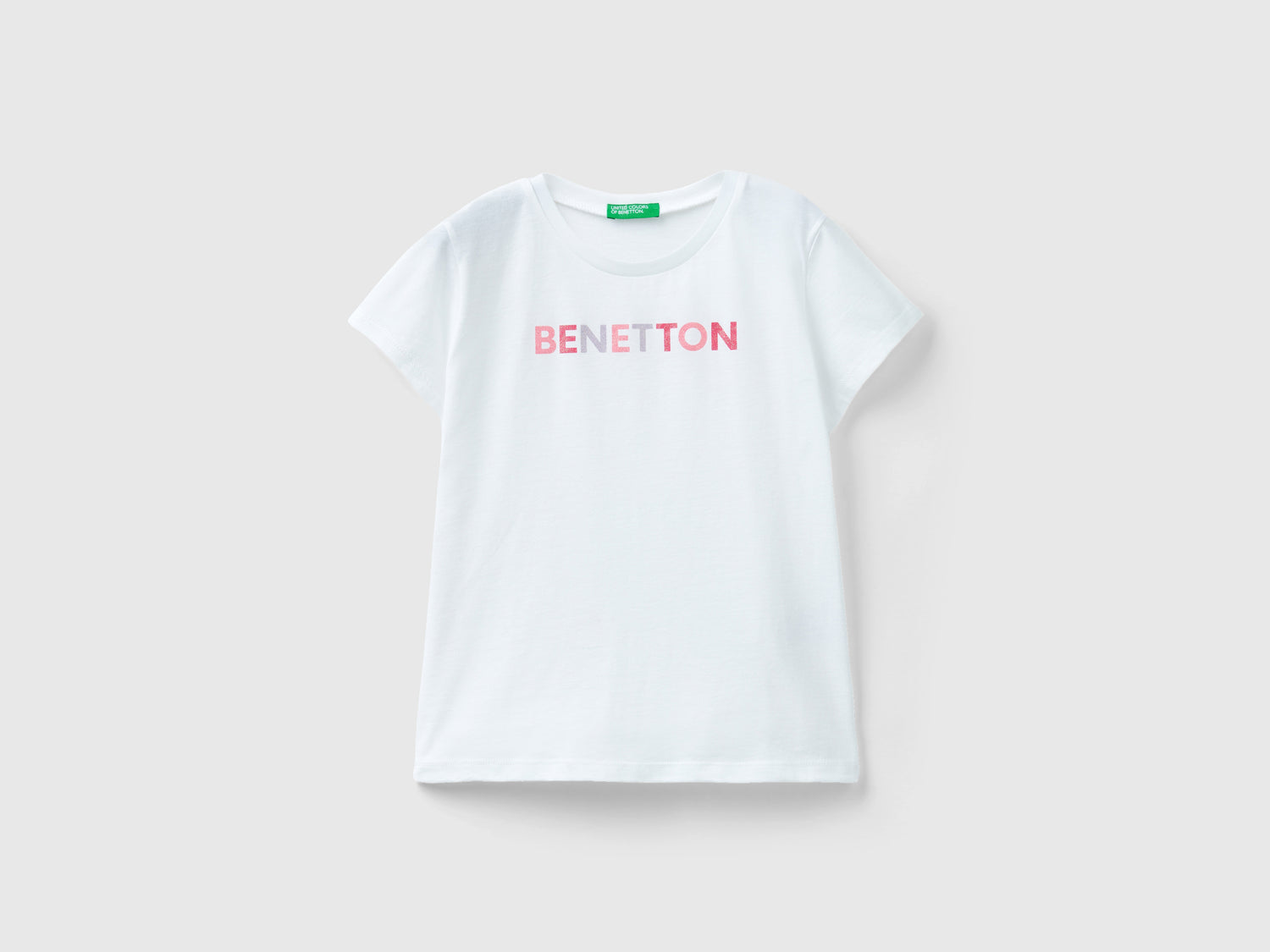 T-shirt con logo glitter in cotone bio da bambina bianco | Benetton Outlet