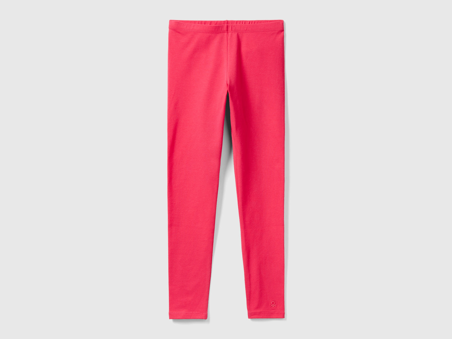 Leggings in cotone stretch con logo da bambina fucsia | Benetton Outlet