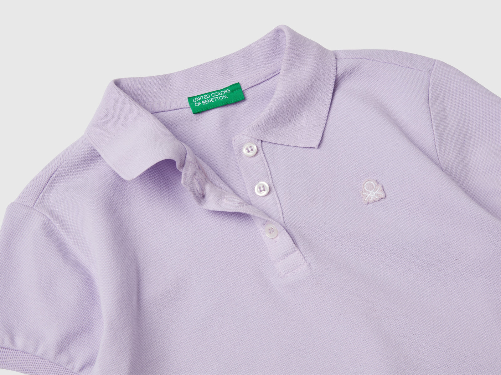 Polo manica corta in cotone da bambina lilla 2 | Benetton Outlet