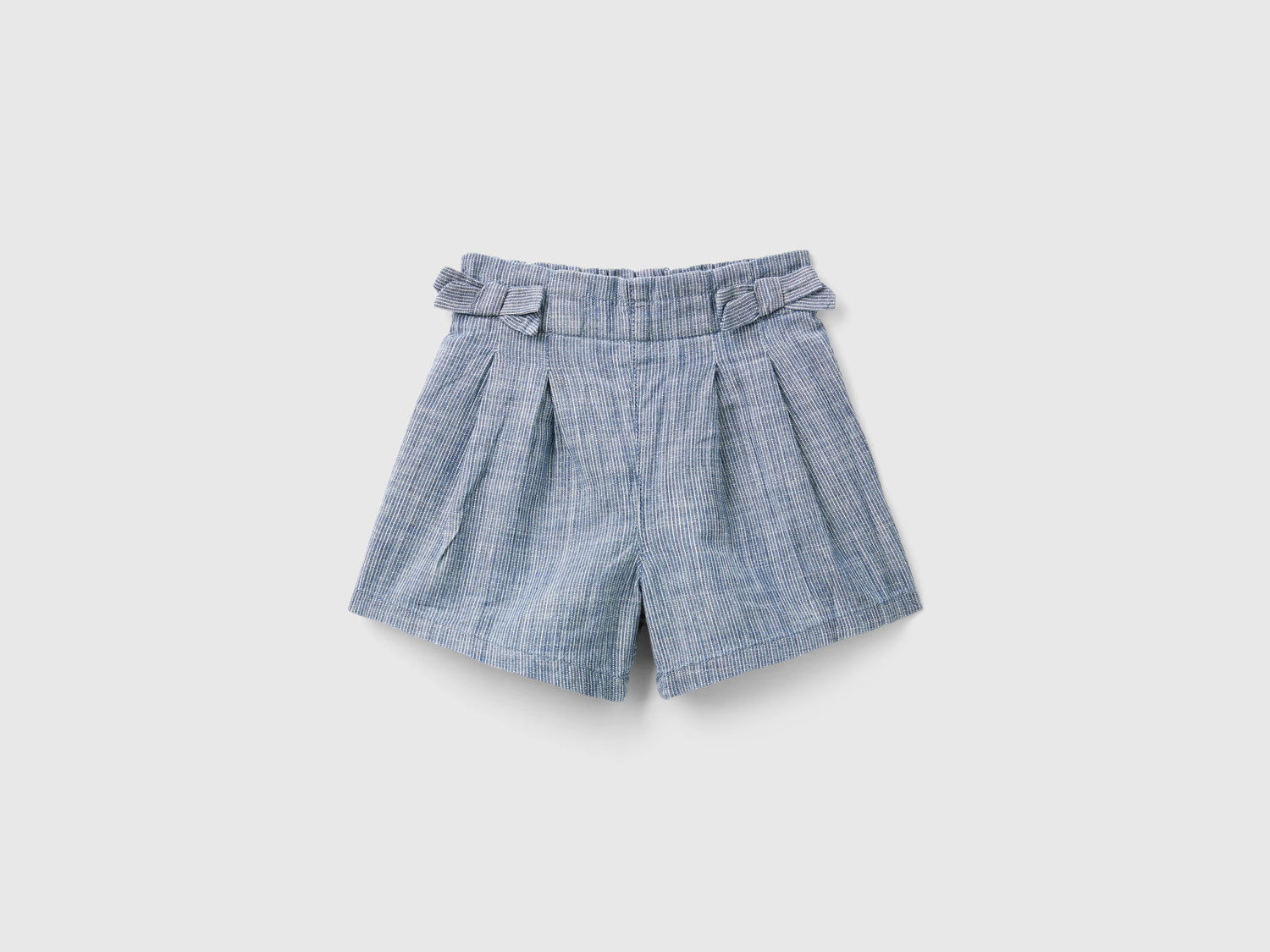 Shorts paperbag in chambray da bimba blu | Benetton Outlet