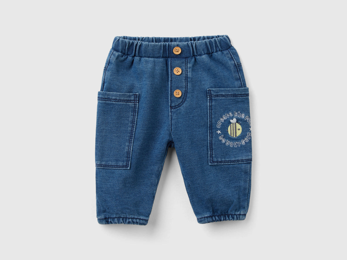 Pantalón sudadera efecto denim con bolsillos