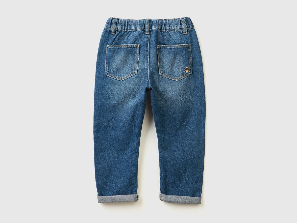 Jeans 100% cotone con maxi tasche