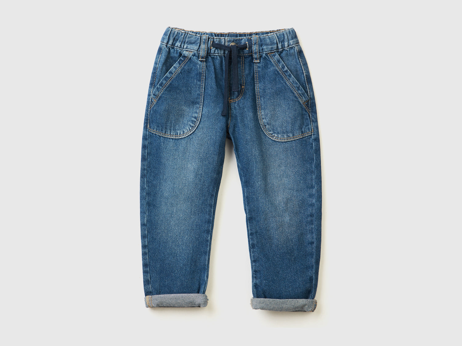 Jeans 100% cotone con maxi tasche da bimbo blu scuro | Benetton Outlet