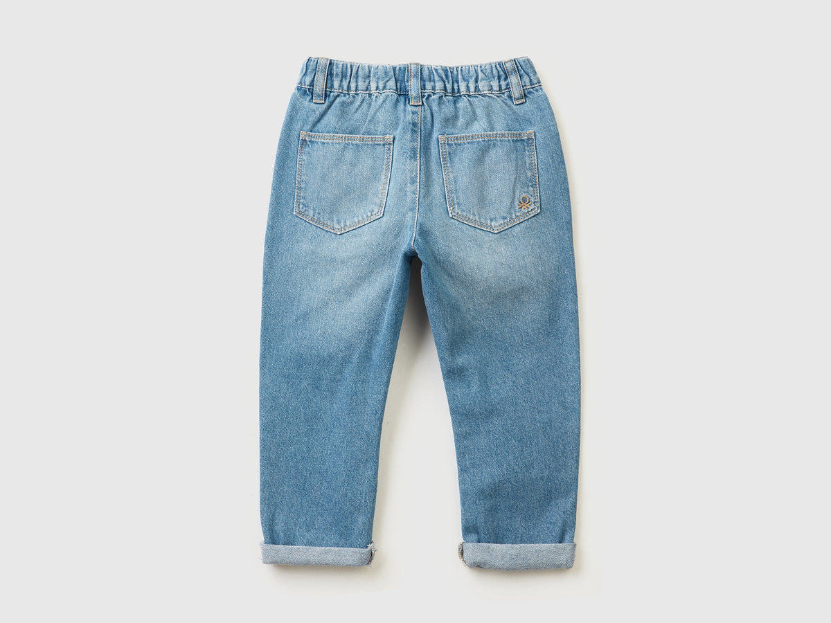 Jeans 100% cotone con maxi tasche
