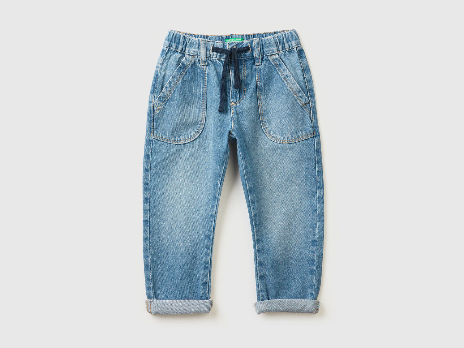 Jeans 100% cotone con maxi tasche da bimbo blu | Benetton Outlet
