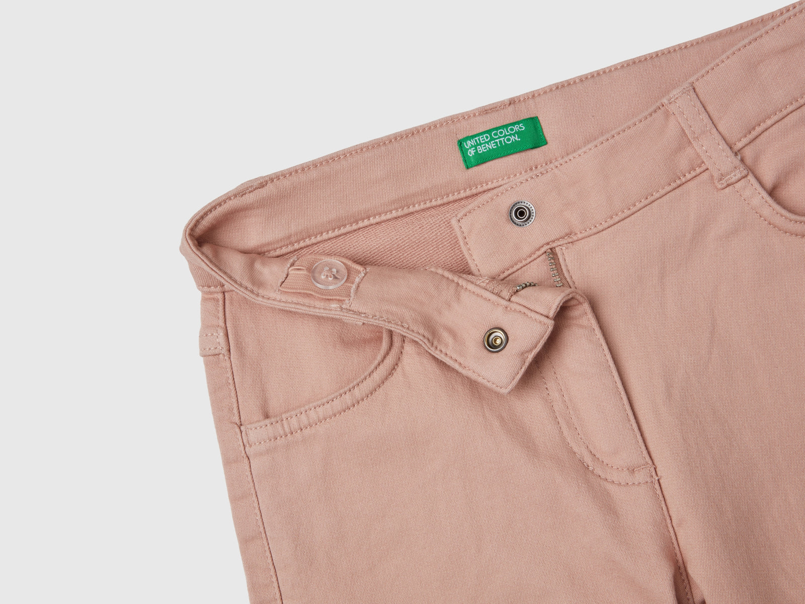 Pantalones acampanados elásticos da bambina rosa tenue 3 | Benetton Outlet