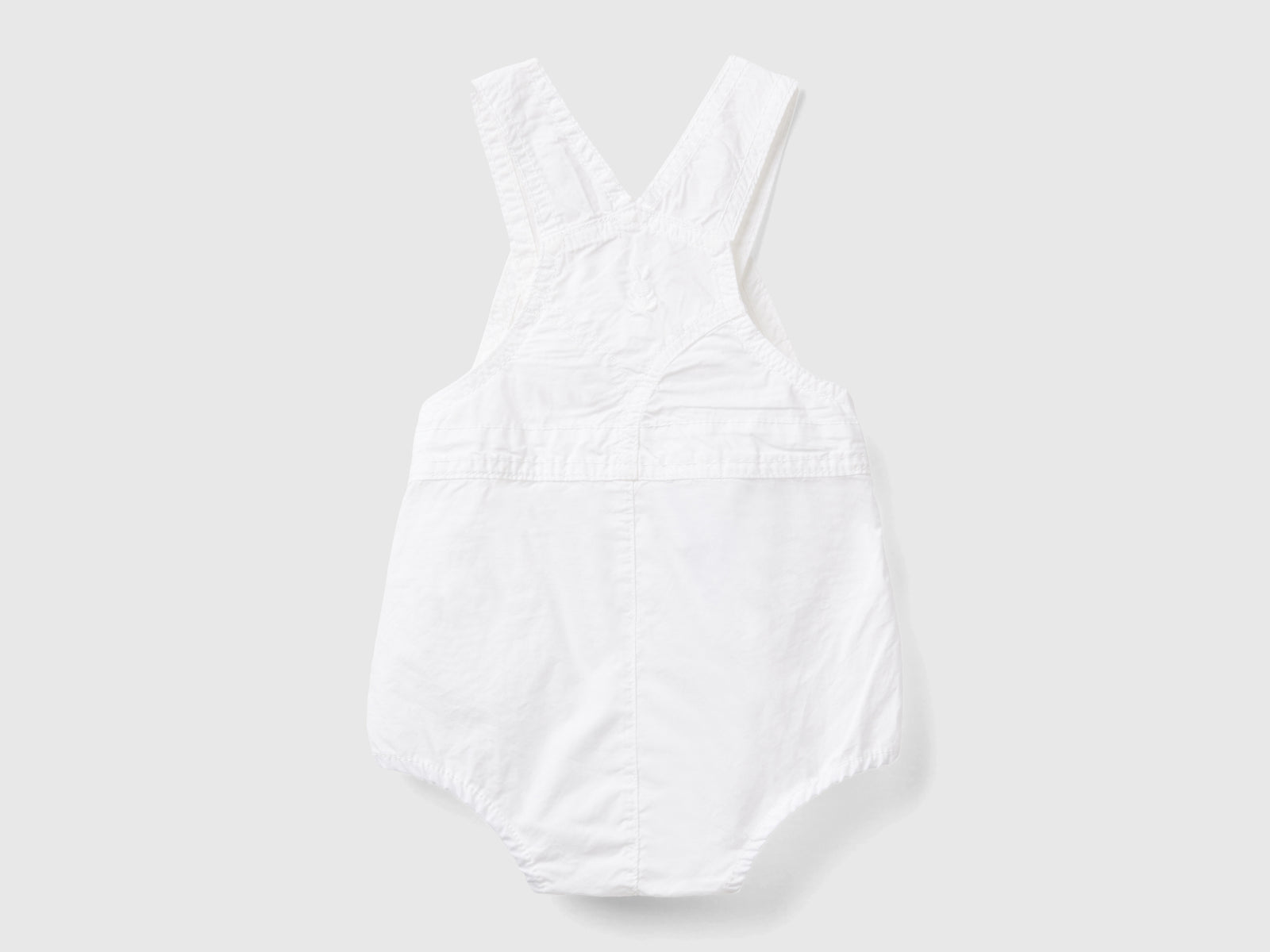 Pagliaccetto salopette in 100% cotone da neonato bianco 2 | Benetton Outlet