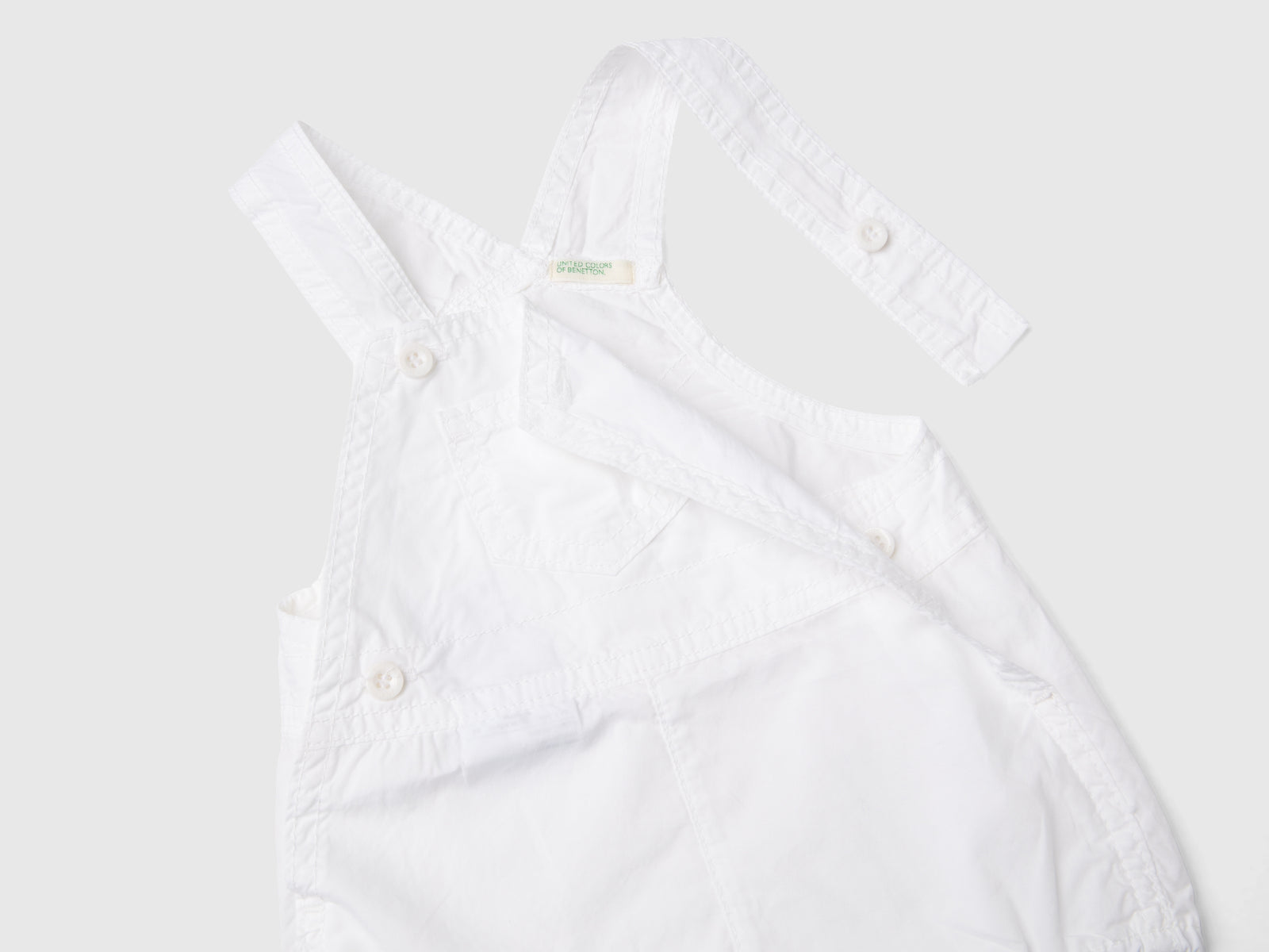 Pagliaccetto salopette in 100% cotone da neonato bianco 3 | Benetton Outlet