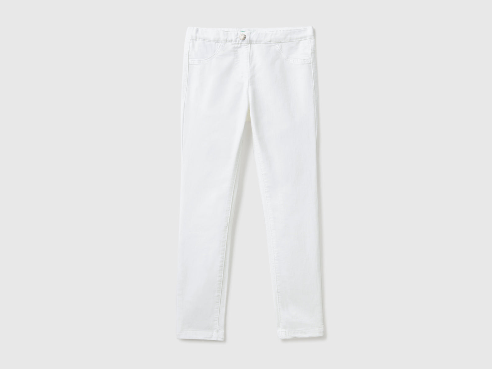 Pantaloni super skinny da bambina bianco | Benetton Outlet