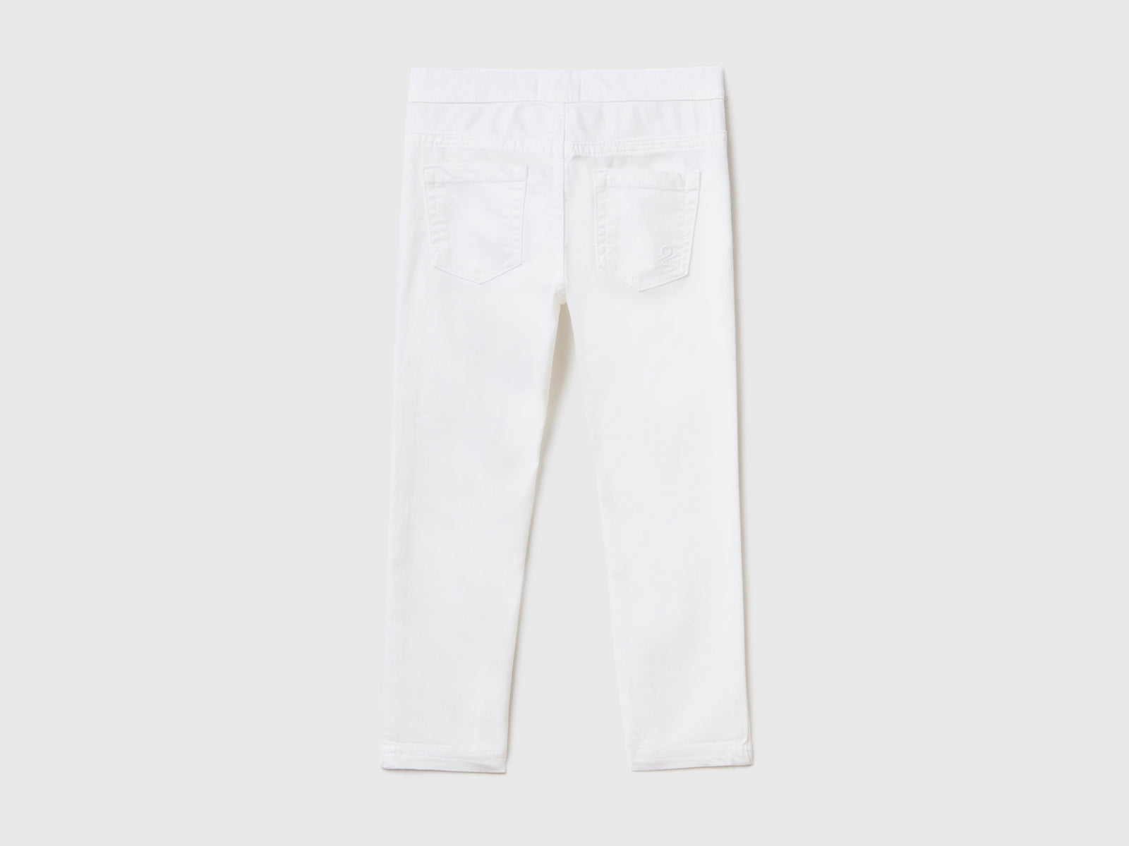 Jeggings in misto cotone stretch da bimba bianco 2 | Benetton Outlet