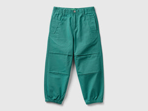 Pantaloni con tagli 100% cotone