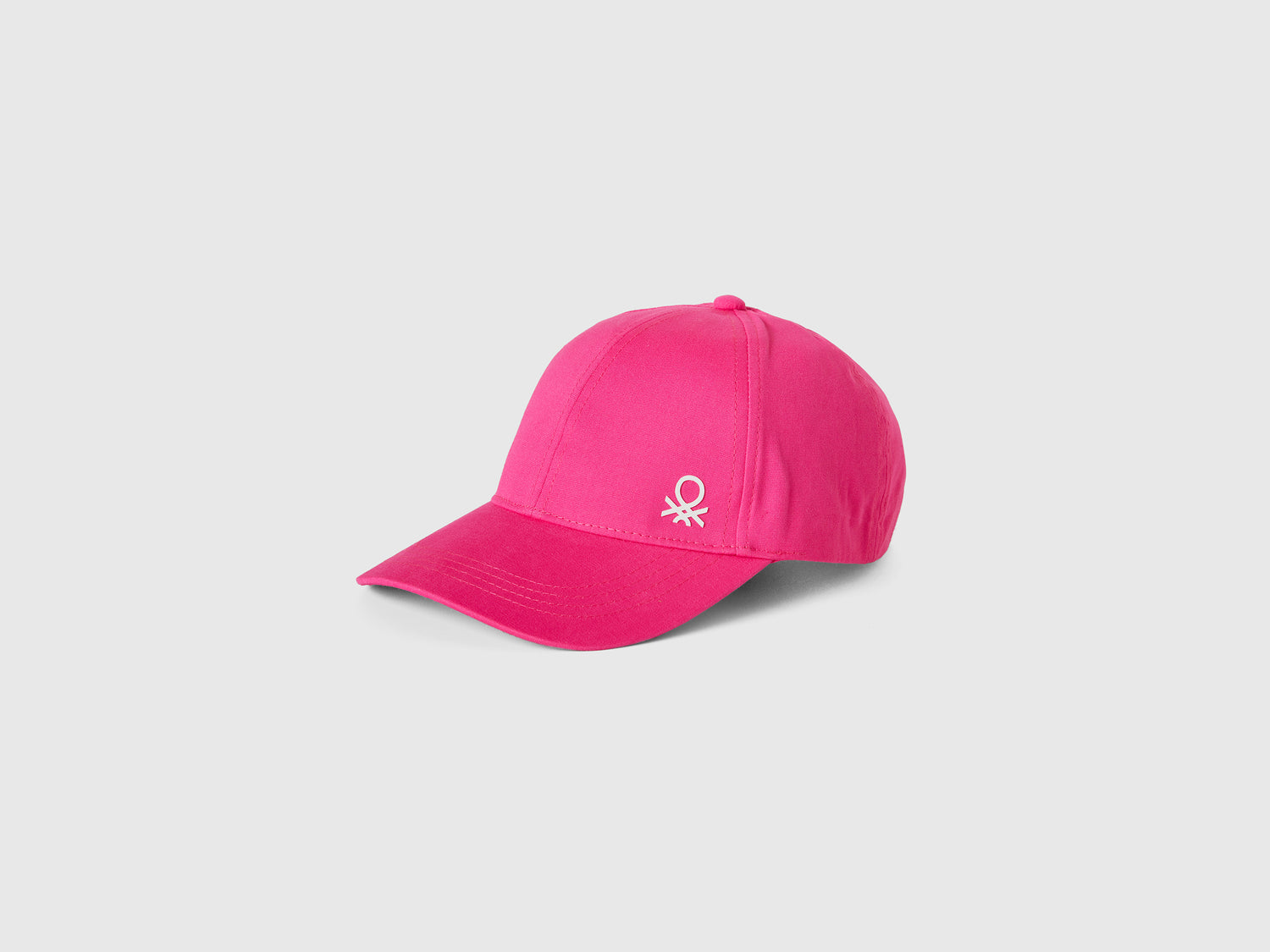 Cappellino con visiera da bambino fucsia | Benetton Outlet