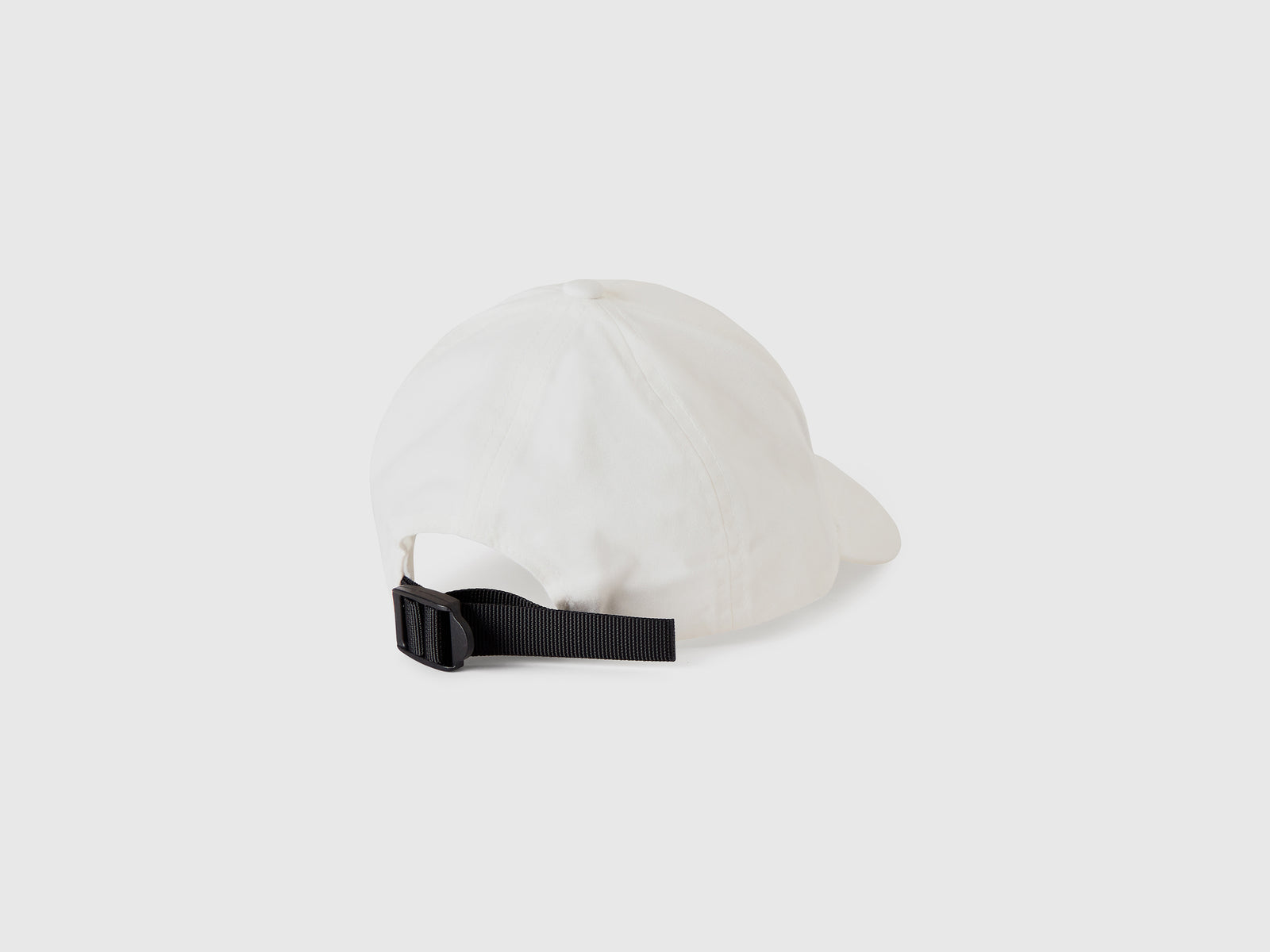 Cappellino con visiera da bimbo bianco 2 | Benetton Outlet