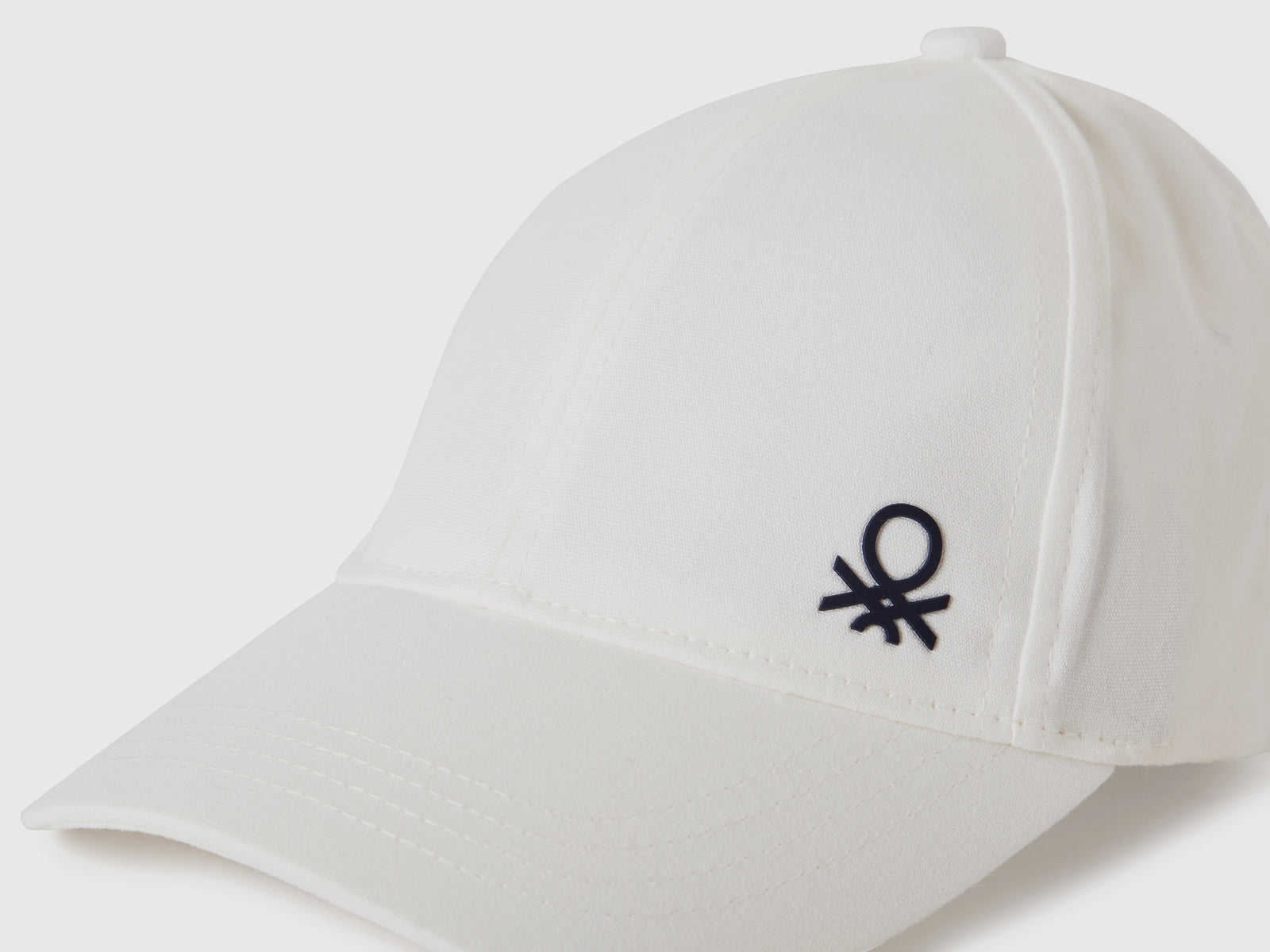 Cappellino con visiera da bimbo bianco 3 | Benetton Outlet