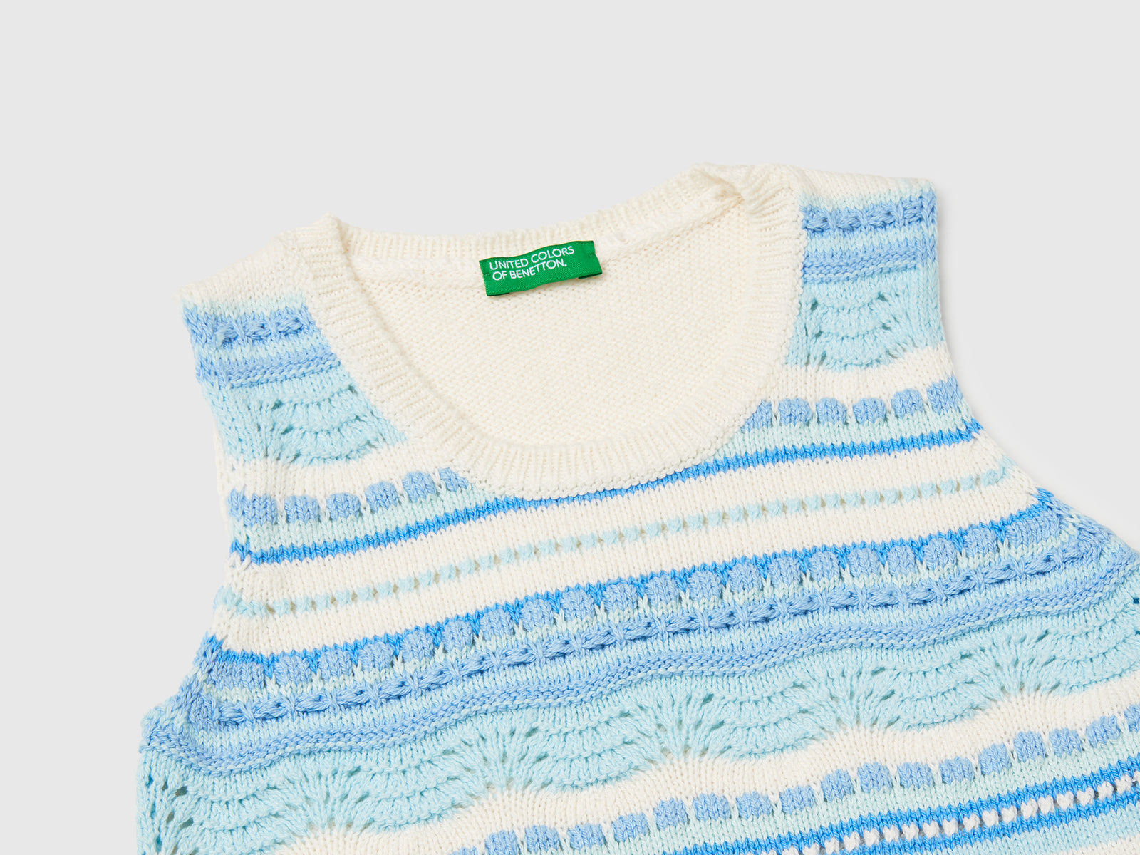 Top in maglia lavorato da bimba vaniglia 3 | Benetton Outlet