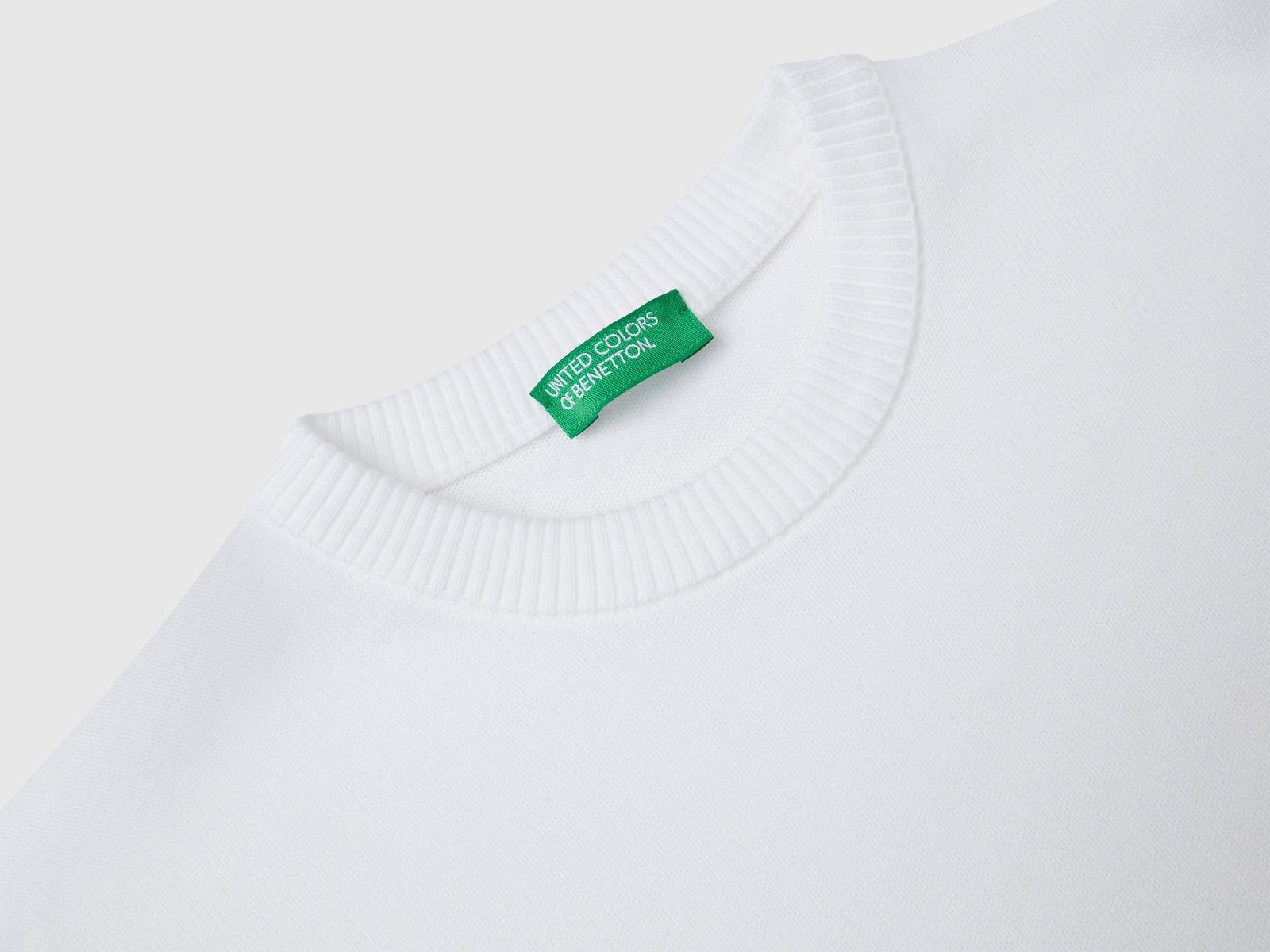 Maglioncino in puro cotone con logo da bambino bianco 3 | Benetton Outlet