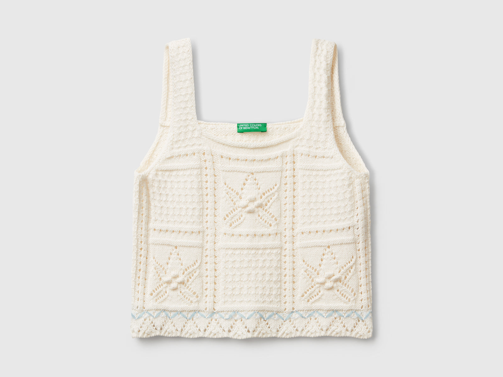 Top in maglia con stelle da bambina vaniglia | Benetton Outlet