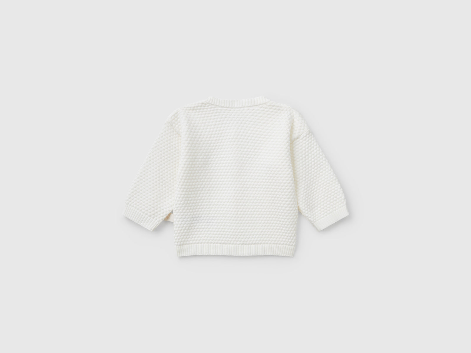 Cardigan lavorato 100% cotone da neonato bianco panna 2 | Benetton Outlet