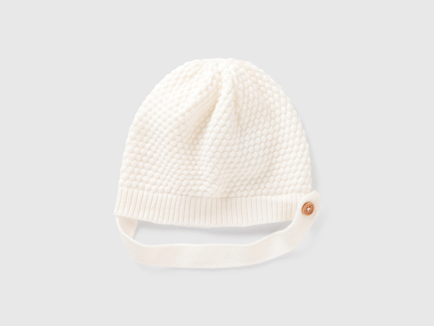 Cappellino lavorato 100% cotone da neonato bianco panna | Benetton Outlet