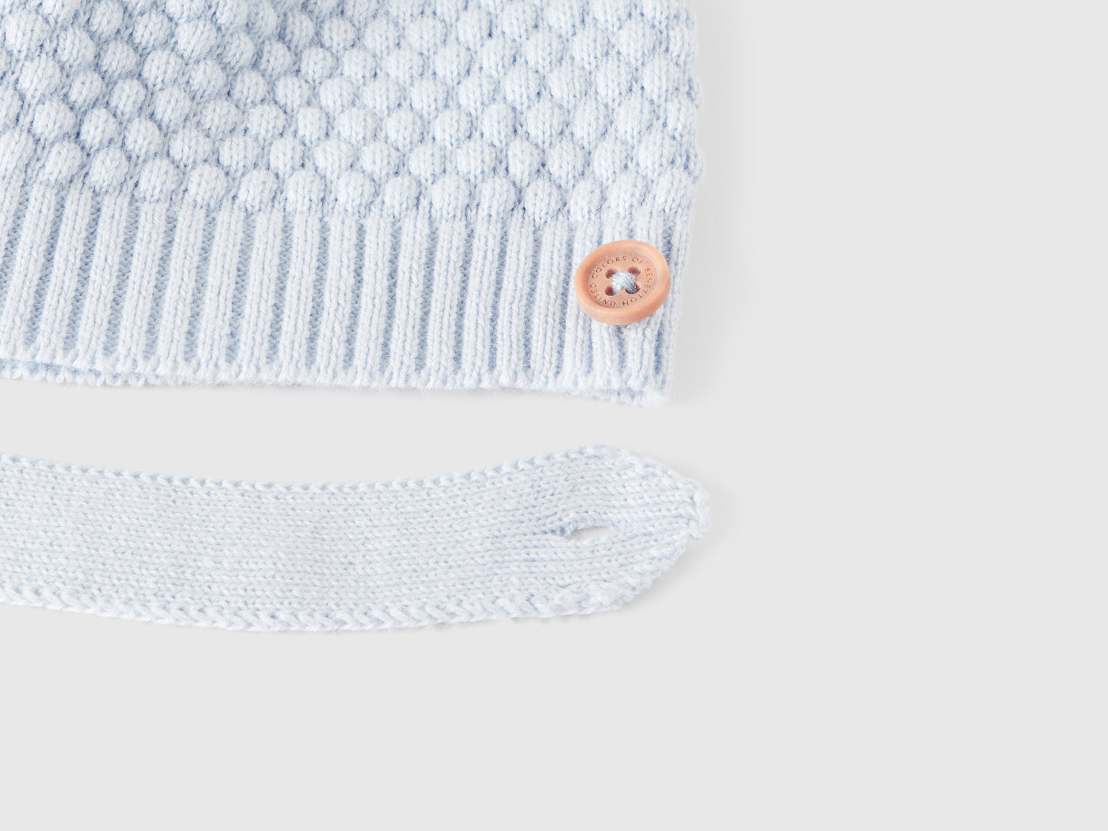 Cappellino lavorato 100% cotone da neonato celeste 3 | Benetton Outlet