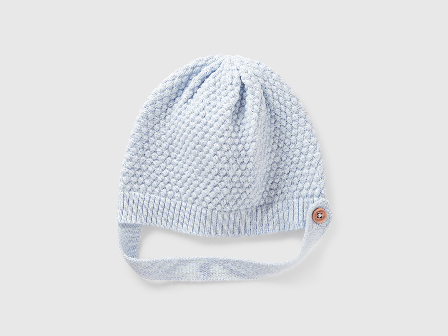Cappellino lavorato 100% cotone da neonato celeste | Benetton Outlet