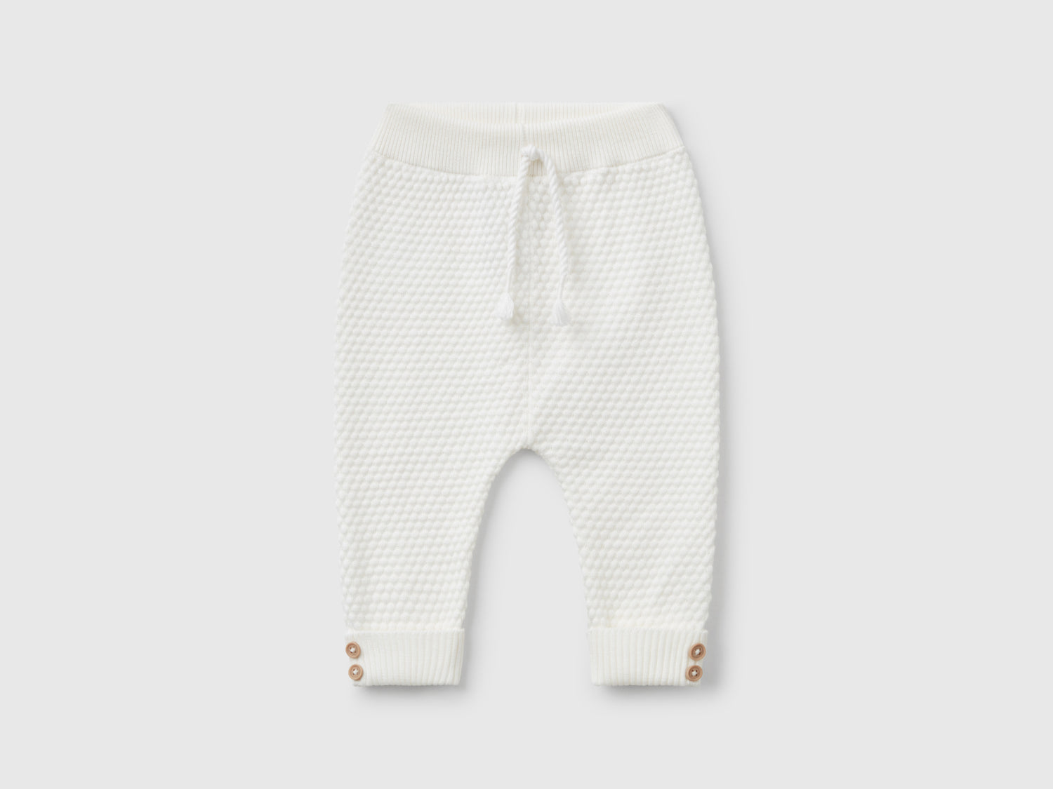 Pantaloni lavorati 100% cotone da neonato bianco panna | Benetton Outlet