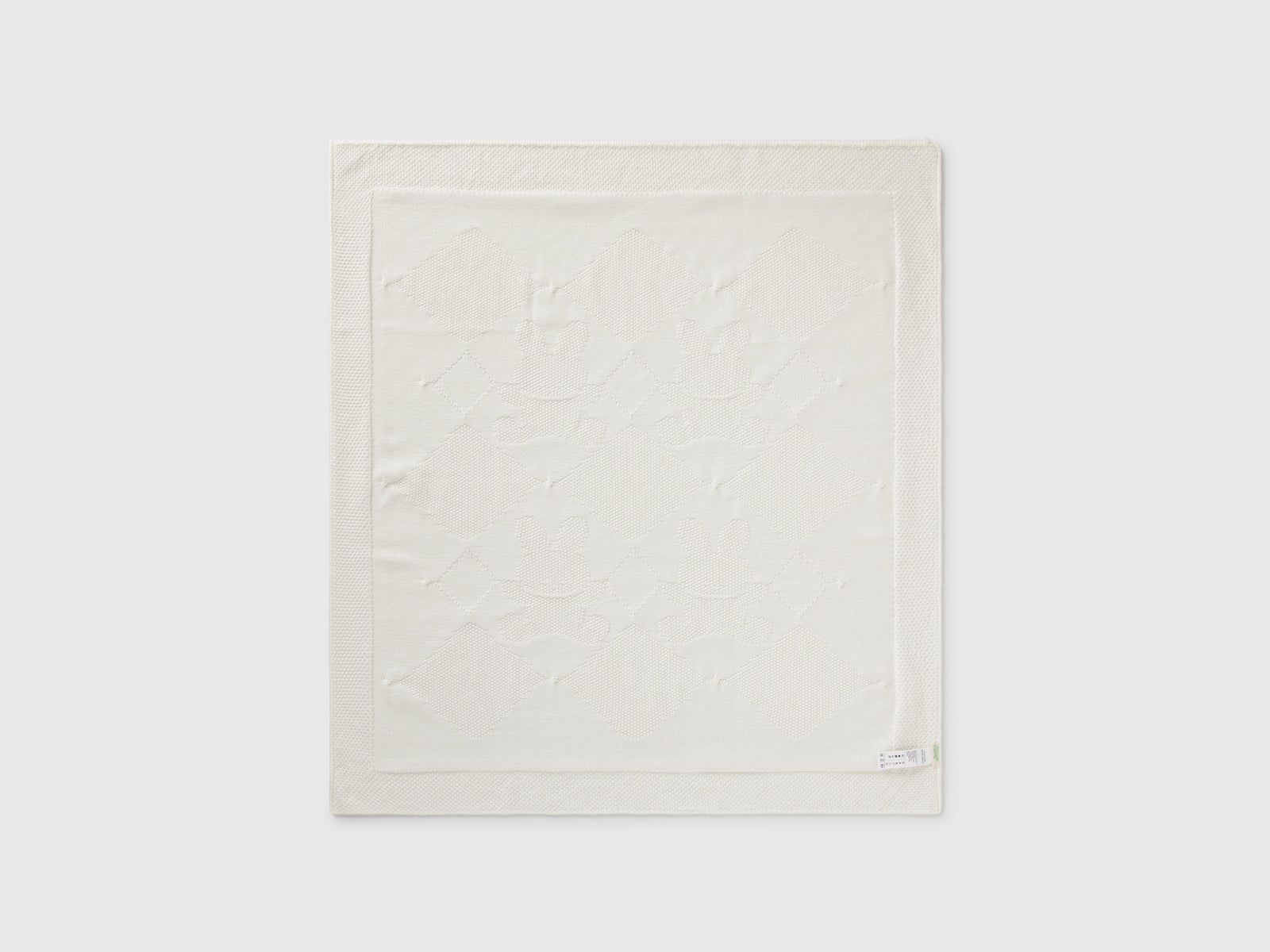 Coperta baby in maglia da neonato bianco panna 2 | Benetton Outlet