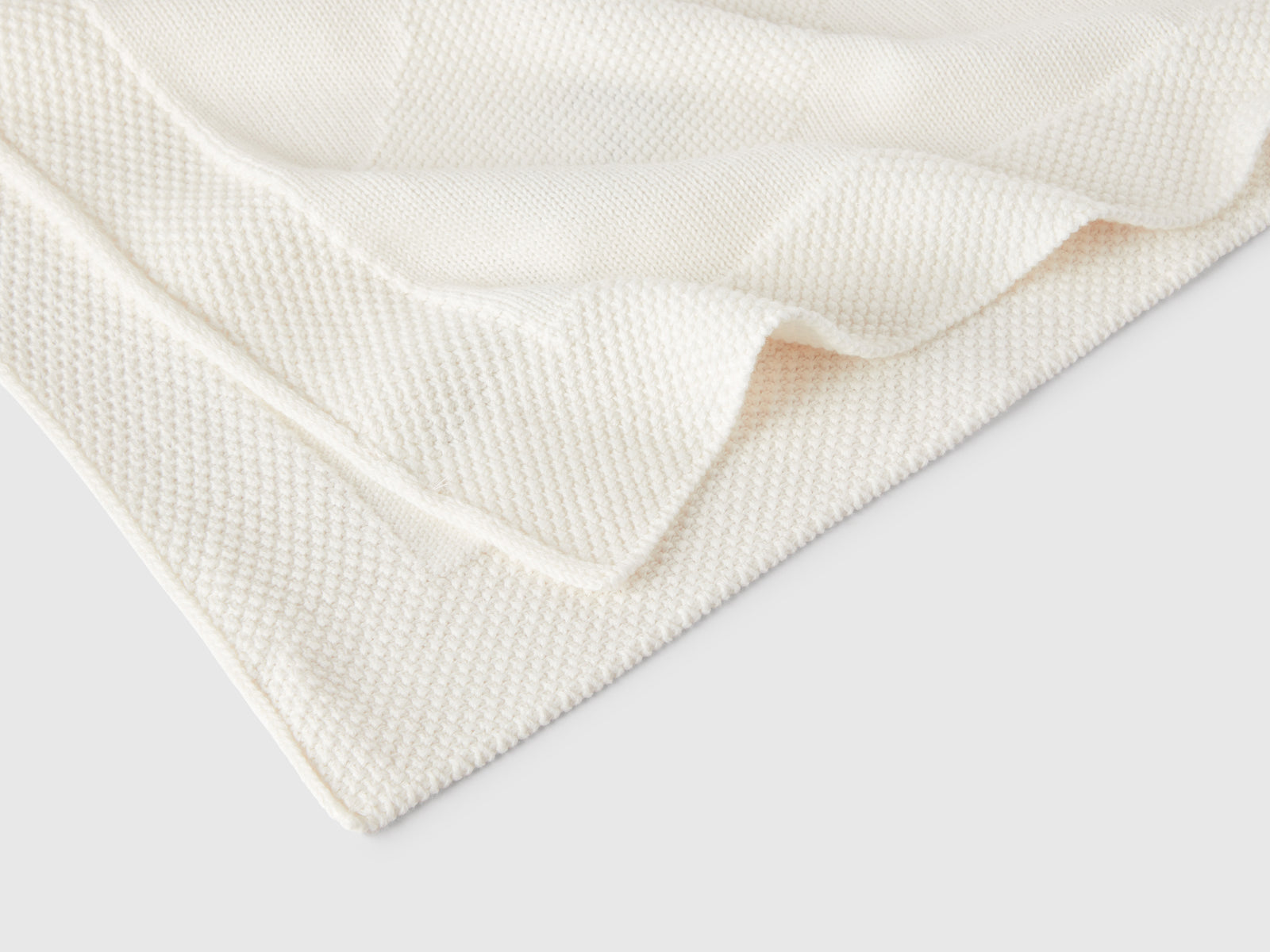 Coperta baby in maglia da neonato bianco panna 3 | Benetton Outlet