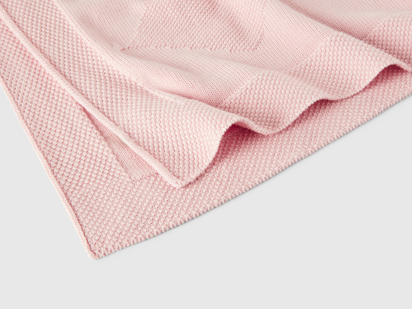 Coperta baby in maglia da neonato rosa tenue 3 | Benetton Outlet