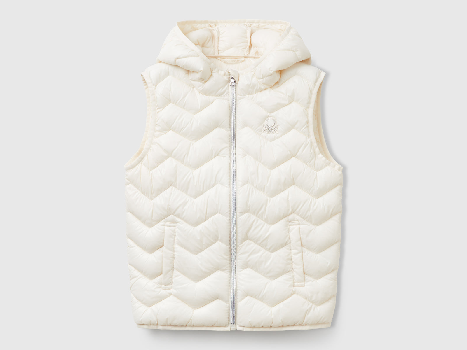 Gilet imbottito con cappuccio da bambina bianco panna | Benetton Outlet