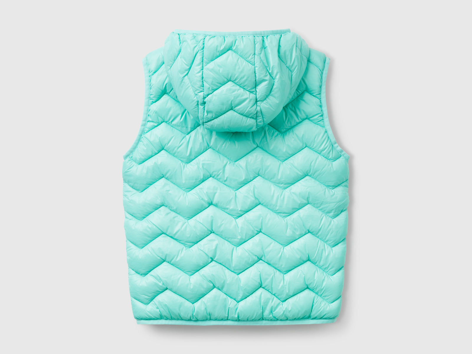 Gilet imbottito con cappuccio da bambina verde acqua 2 | Benetton Outlet