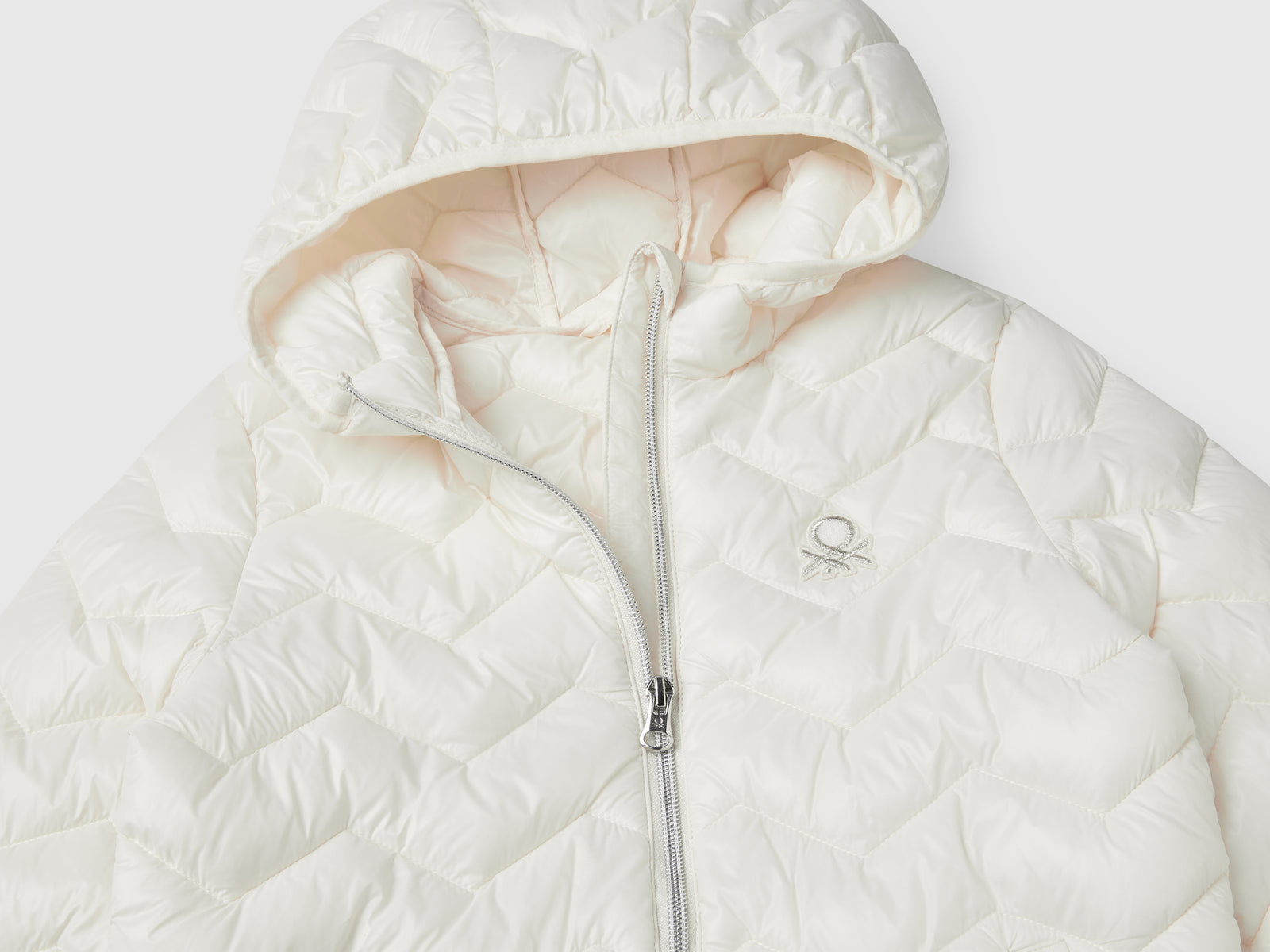 Giubbino imbottito con cappuccio da bambina bianco panna 2 | Benetton Outlet