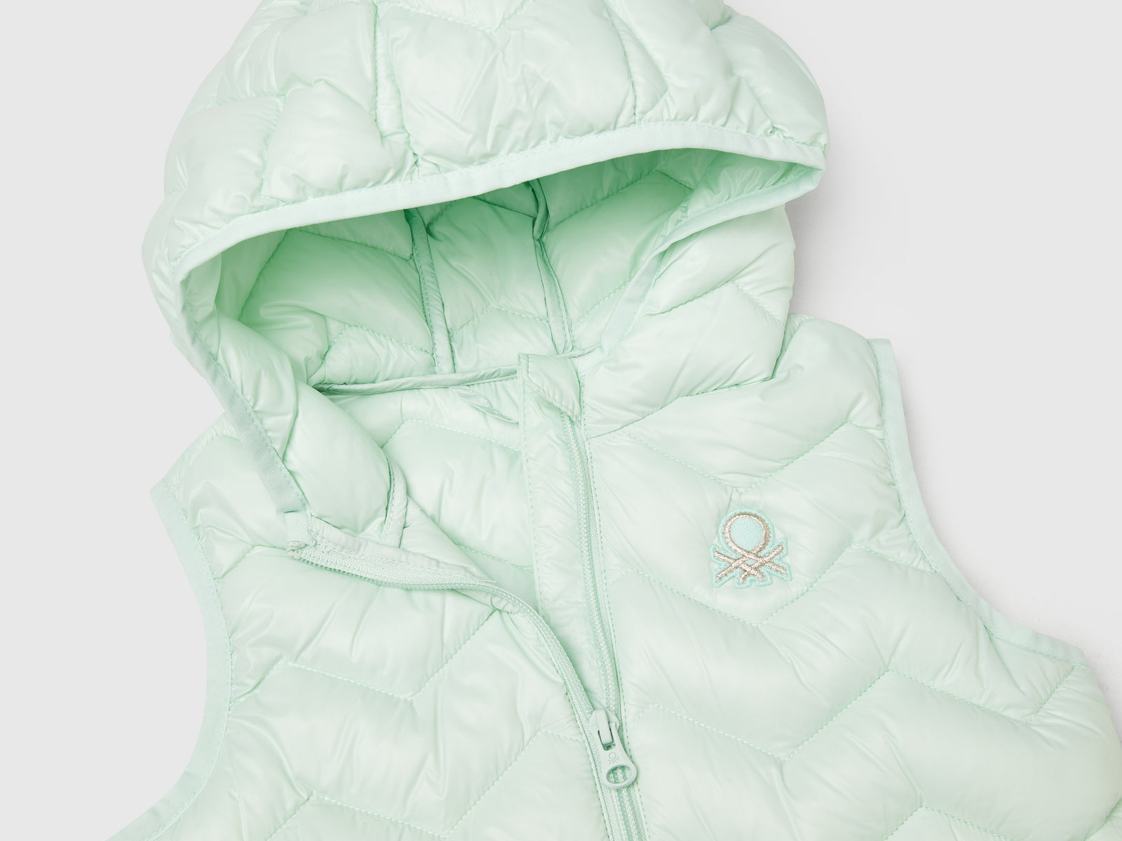 Gilet imbottito con cappuccio da bimba verde acqua 3 | Benetton Outlet