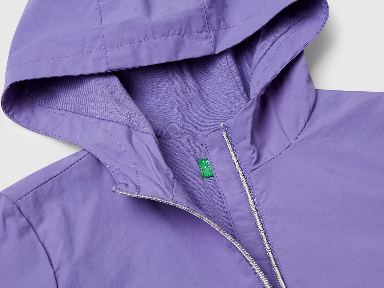 Giacca leggera "Rain Defender" da bambina pervinca 3 | Benetton Outlet