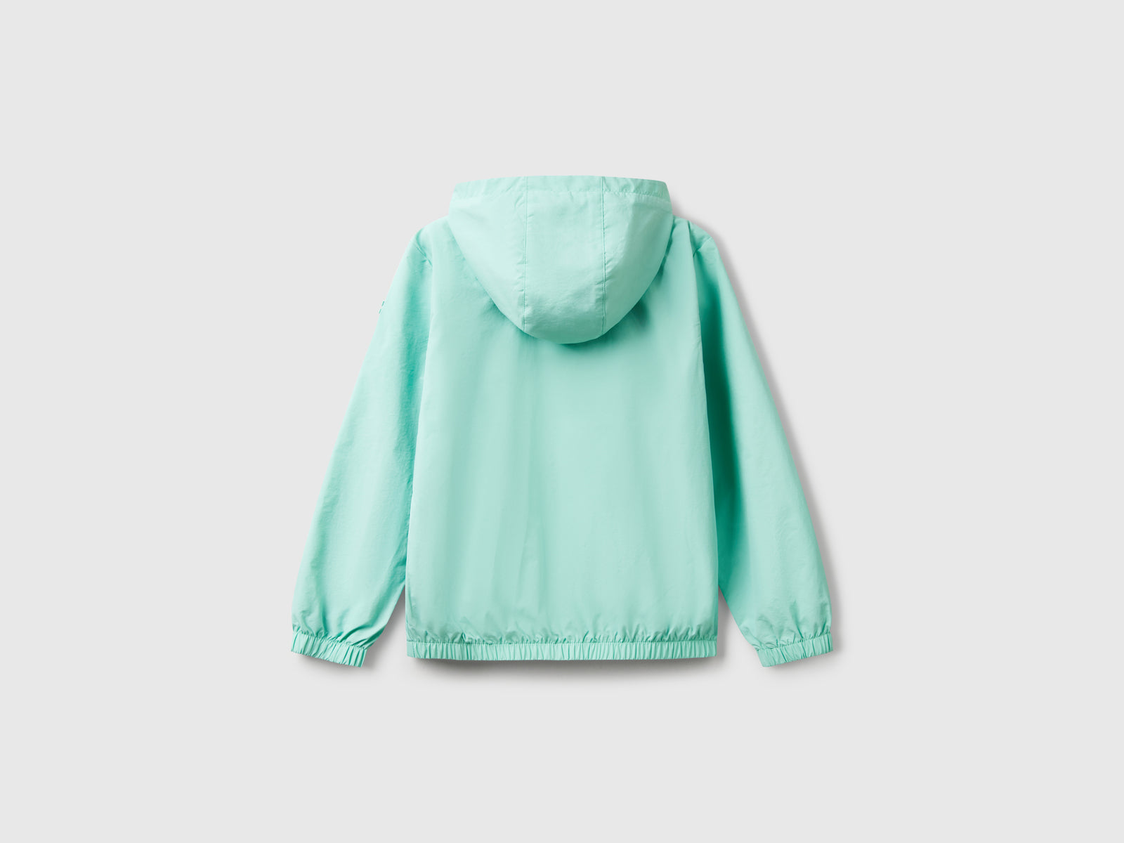 Giacca leggera "Rain Defender" da bambina verde acqua 2 | Benetton Outlet