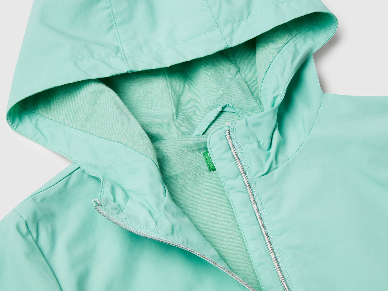 Giacca leggera "Rain Defender" da bambina verde acqua 3 | Benetton Outlet