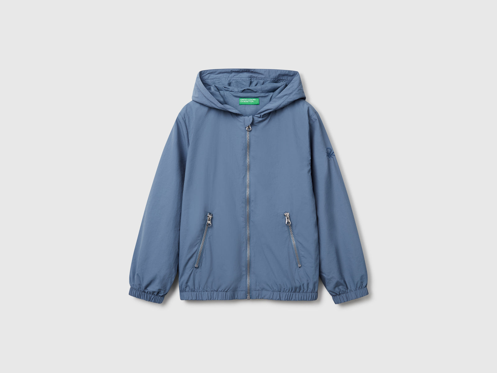 Giubbino in nylon con cappuccio da bambino azzurro | Benetton Outlet