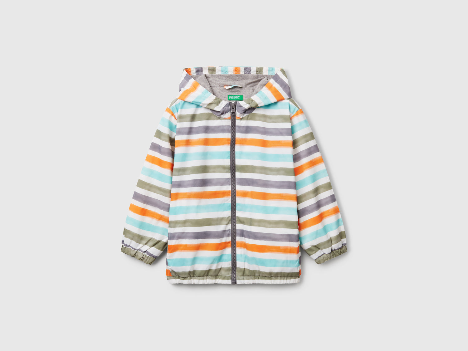 Giubbino leggero a righe con cappuccio da bimbo multi-color | Benetton Outlet