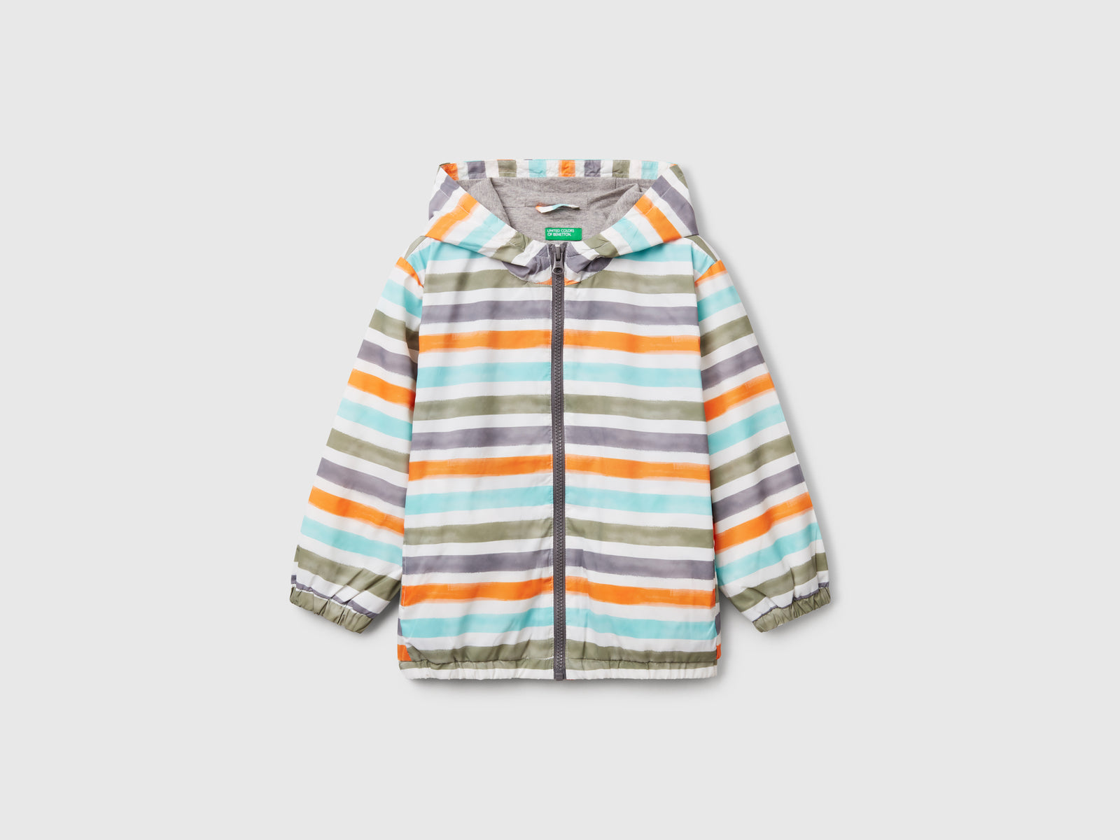 Giubbino leggero a righe con cappuccio da bimbo multi-color | Benetton Outlet