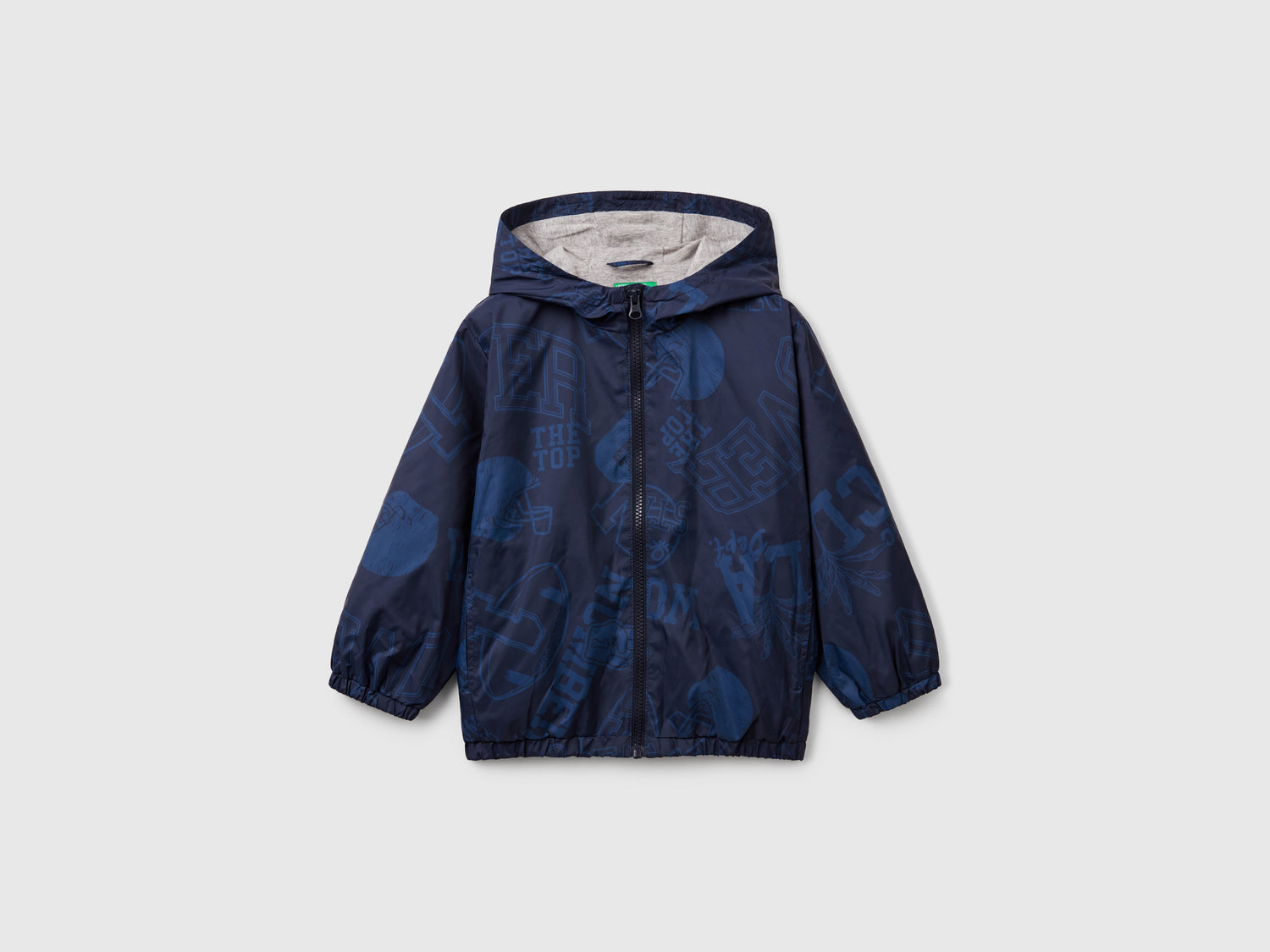 Giubbino leggero fantasia con cappuccio da bimbo blu | Benetton Outlet
