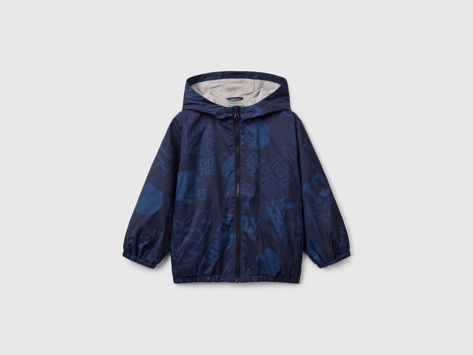Giubbino leggero fantasia con cappuccio da bimbo blu | Benetton Outlet