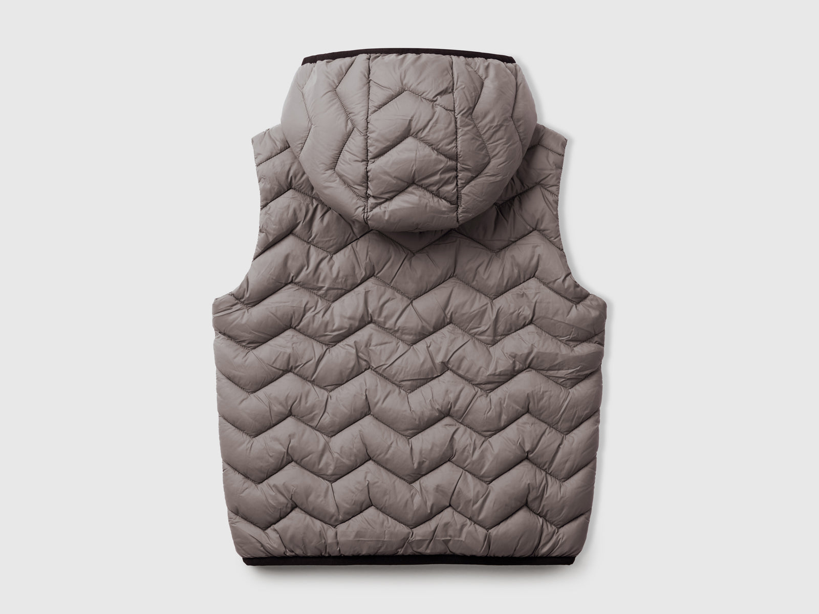 Gilet imbottito con cappuccio da bambino grigio scuro 2 | Benetton Outlet