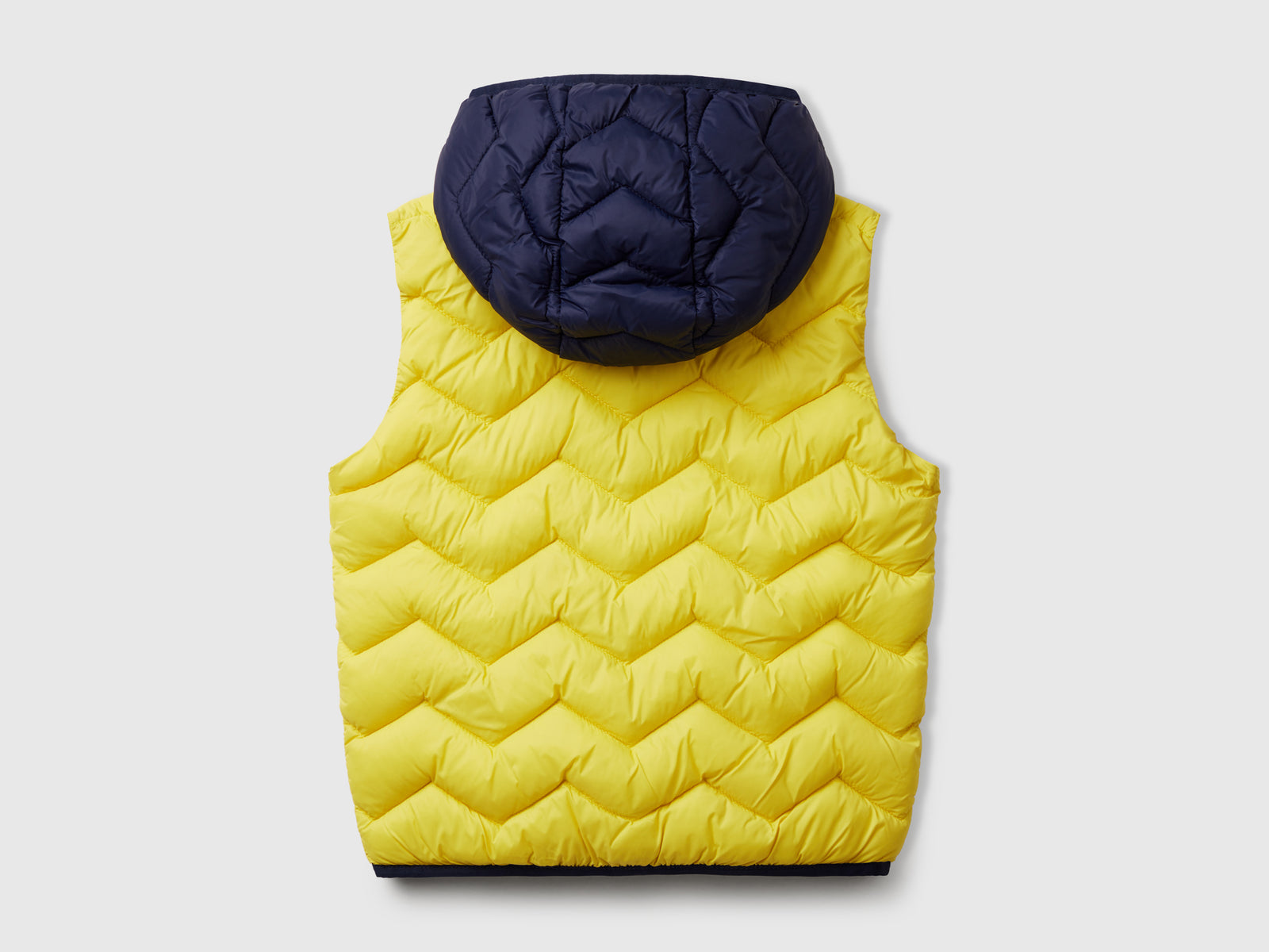 Gilet imbottito con cappuccio da bimbo giallo 2 | Benetton Outlet
