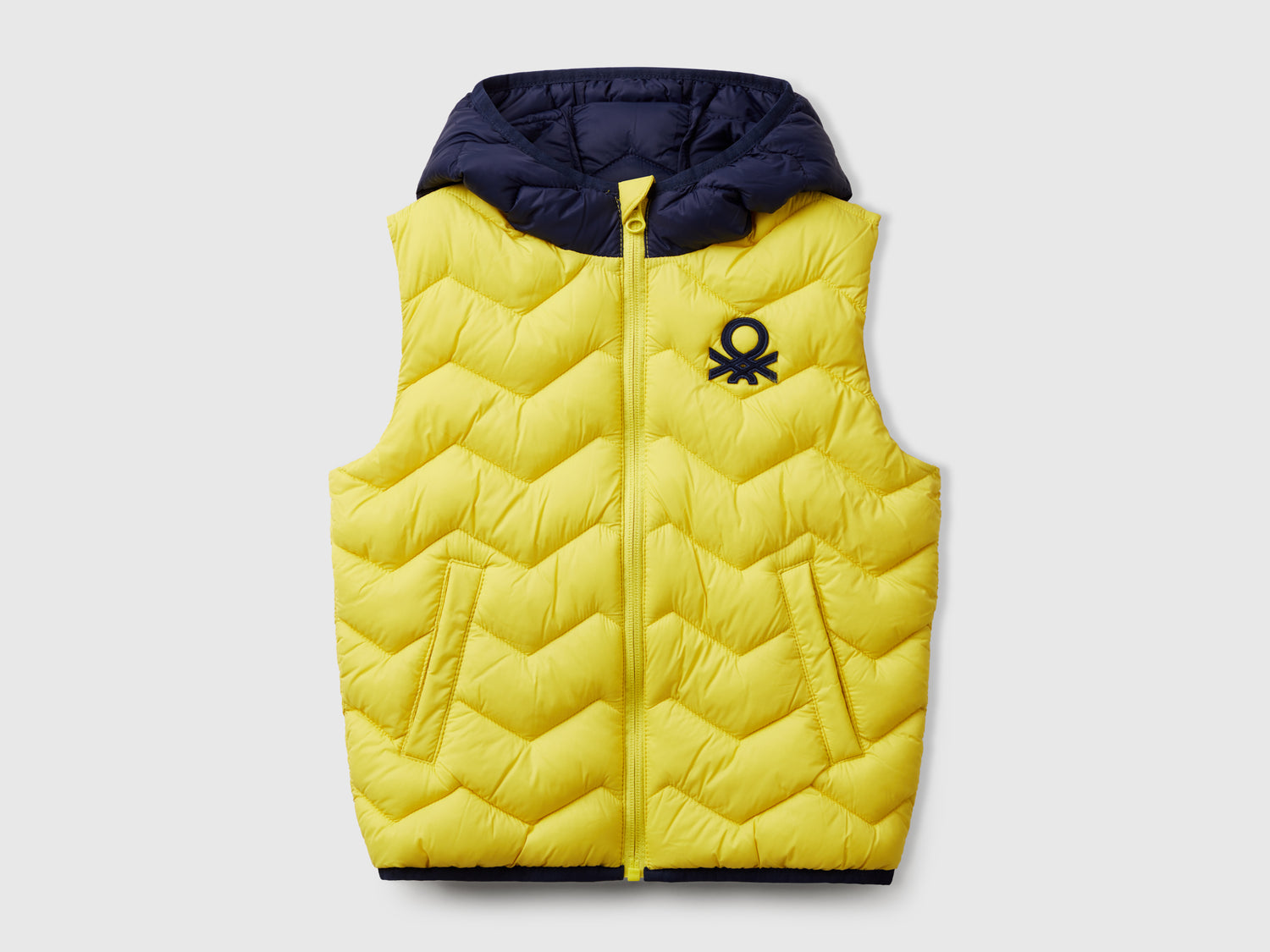 Gilet imbottito con cappuccio da bimbo giallo | Benetton Outlet