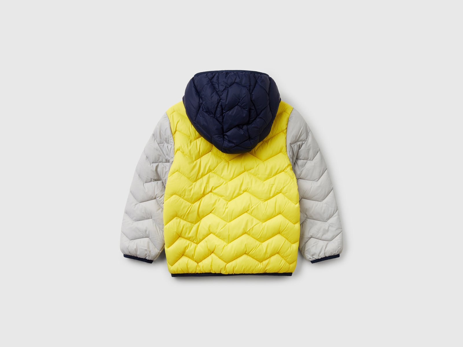 Giubbotto imbottito con cappuccio da bimbo multi-color 2 | Benetton Outlet