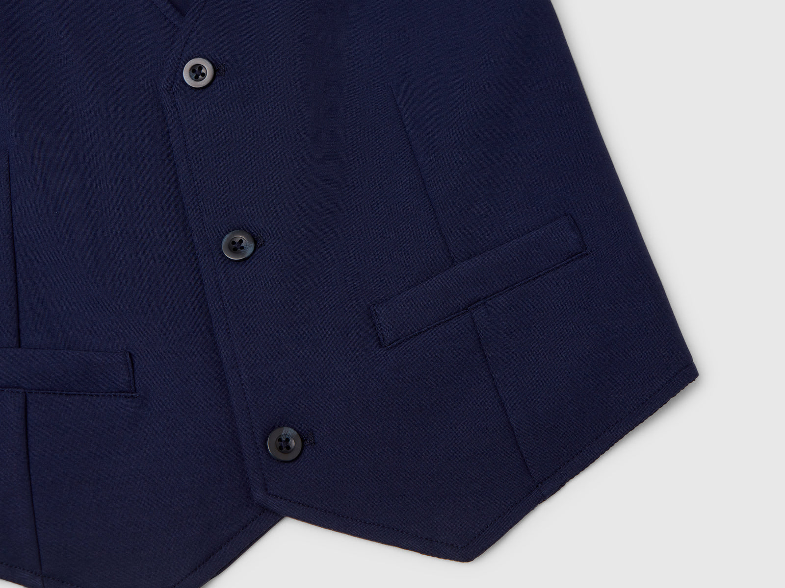 Gilet foderato con bottoni da bambino blu scuro 3 | Benetton Outlet