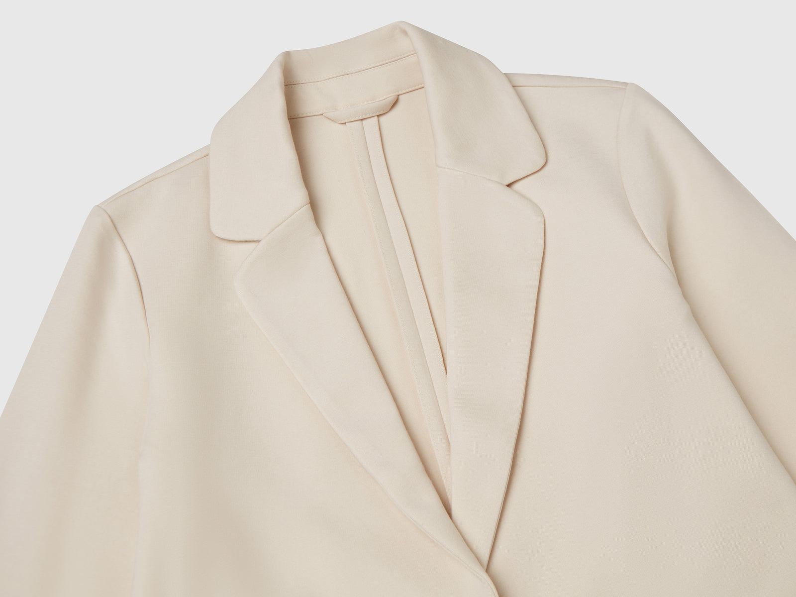 Blazer lungo elegante da bambina bianco panna 3 | Benetton Outlet