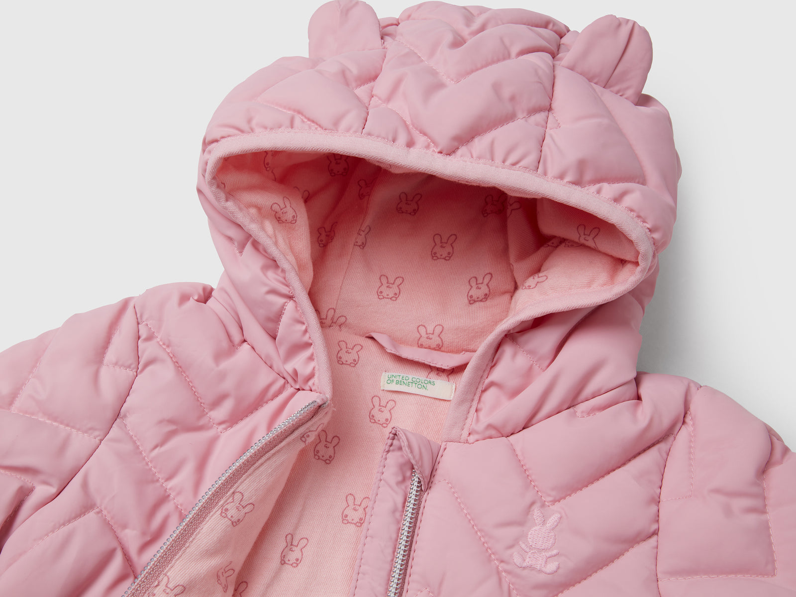 Piumino imbottito con orecchie da neonato rosa 3 | Benetton Outlet