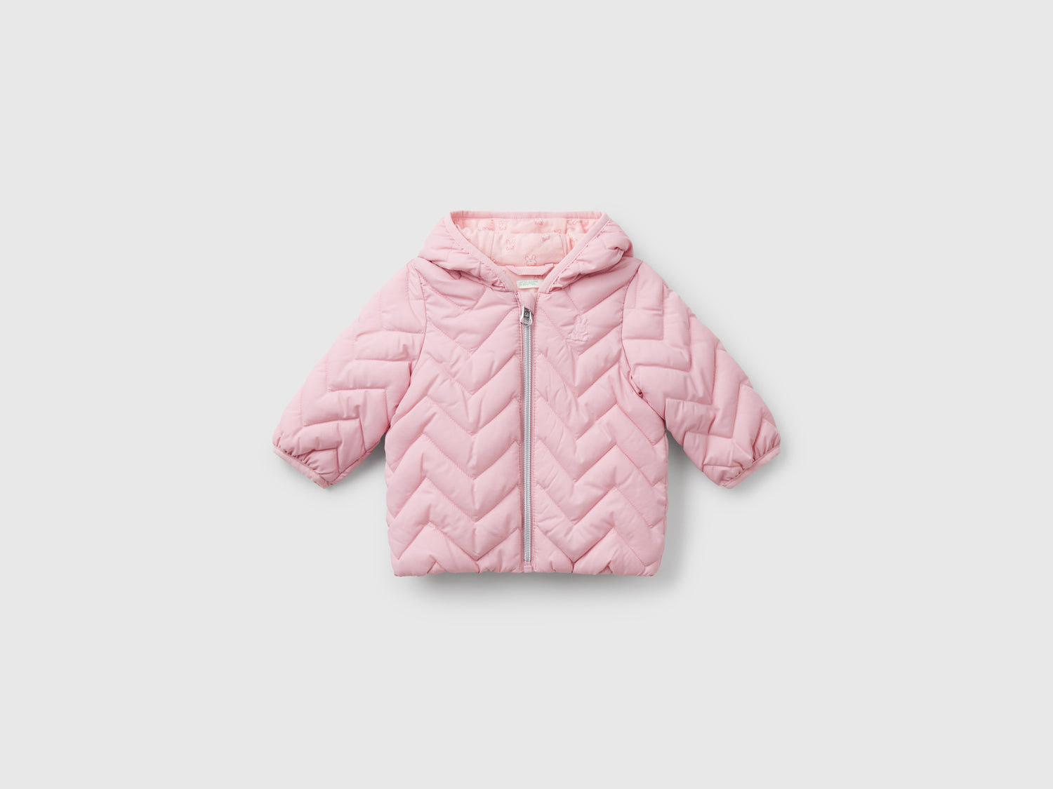 Piumino imbottito con orecchie da neonato rosa | Benetton Outlet