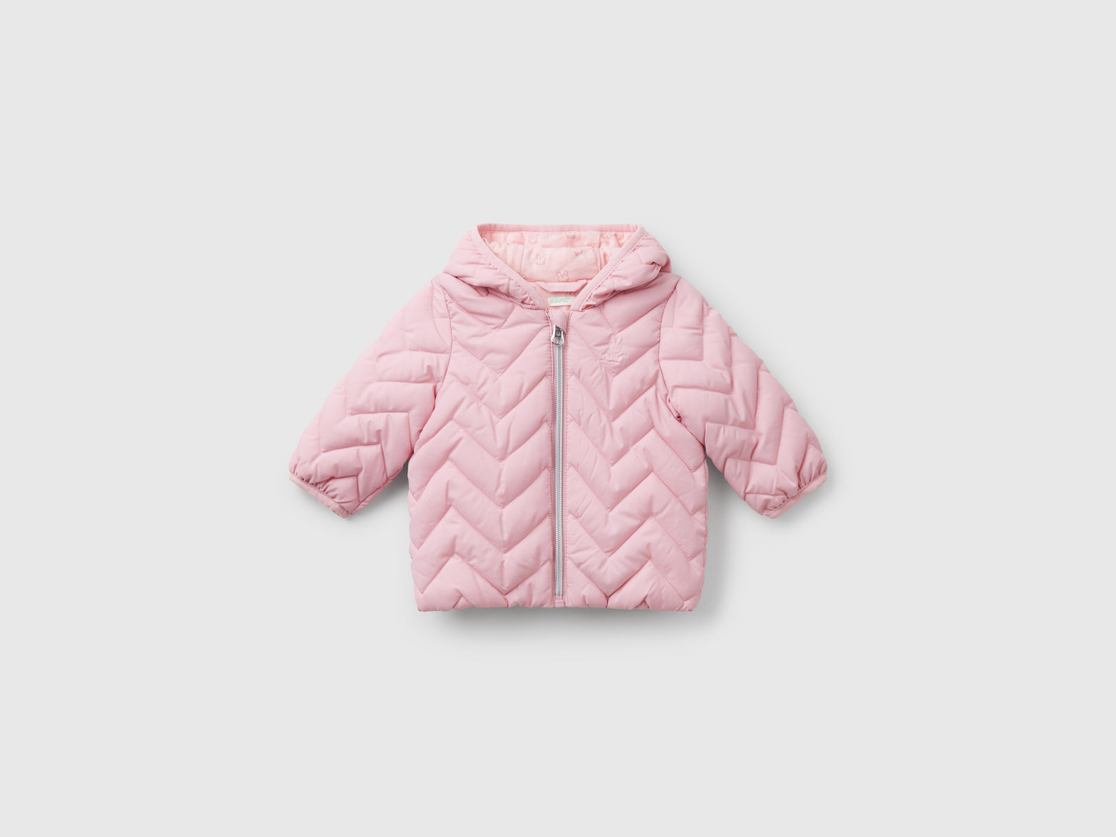 Piumino imbottito con orecchie da neonato rosa | Benetton Outlet